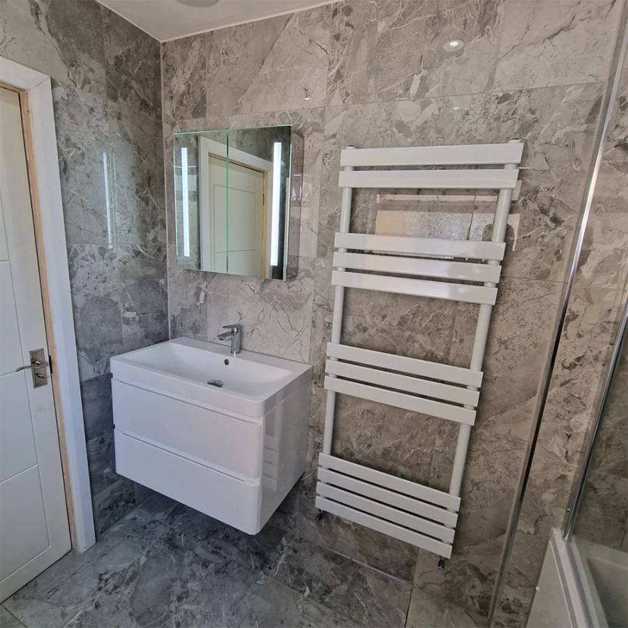 Modern marble ensuite bathroom refurbishment in Chelmsford, Essex by BG Premier